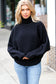 Lady In Black Ribbed Turtleneck Dolman Sweater